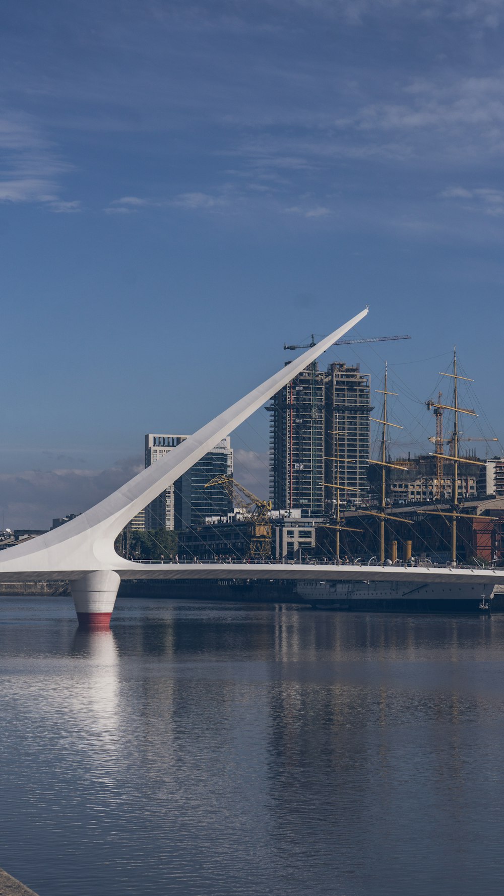 a large white structure sitting on top of a body of water