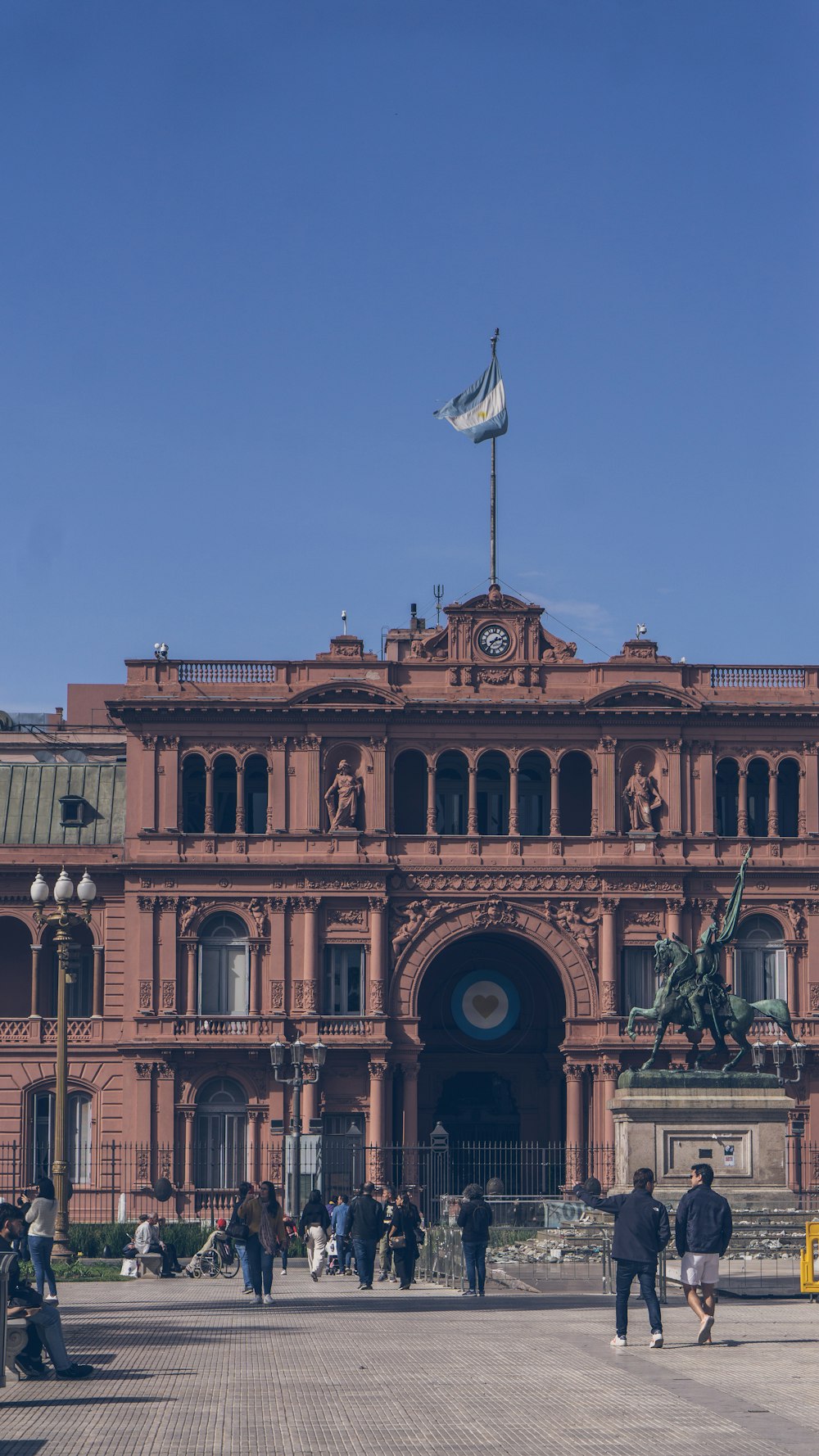 a large building with a flag on top of it