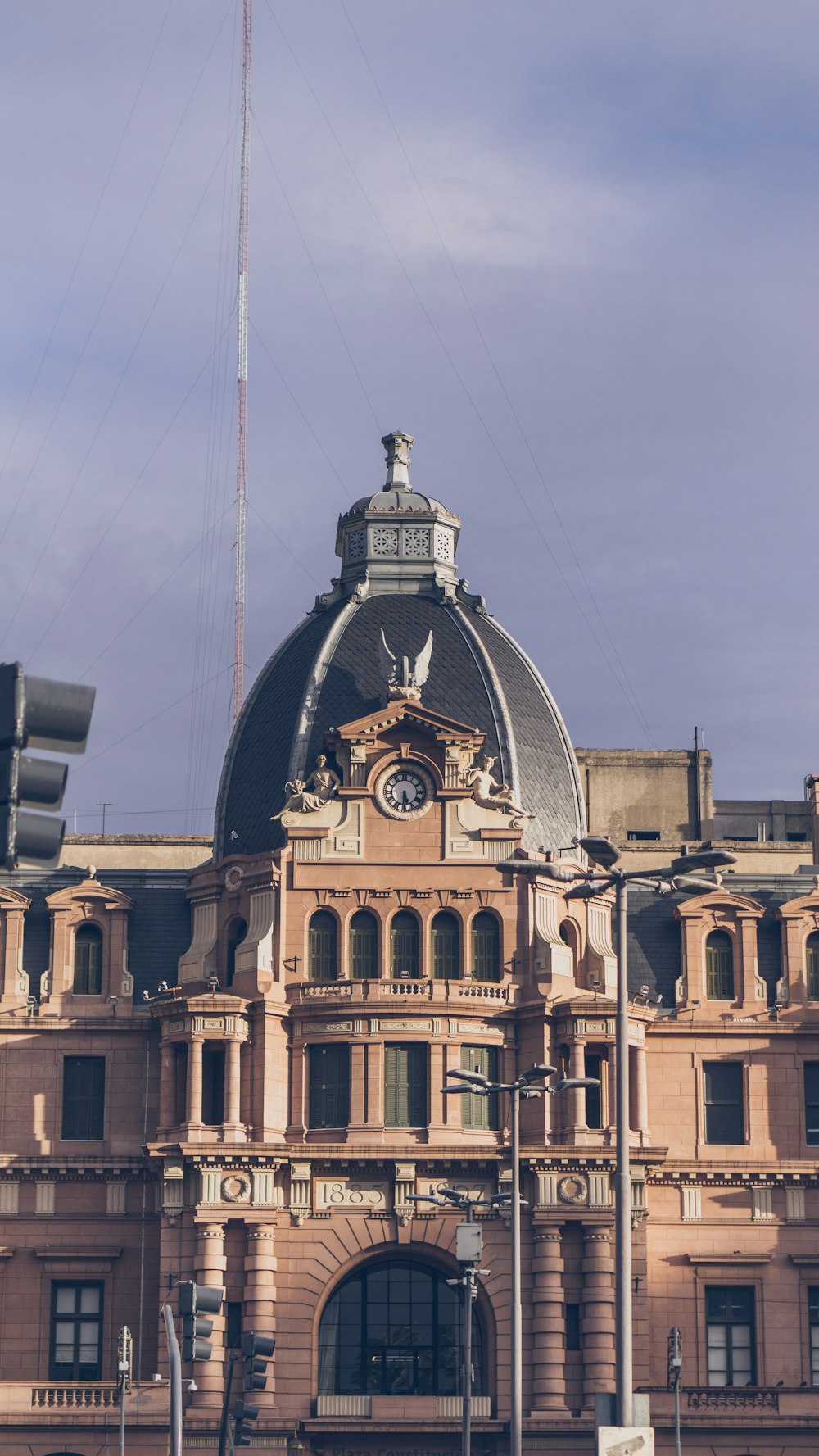 a large building with a clock on the top of it