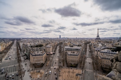 An aerial view of a bustling city with international landmarks.