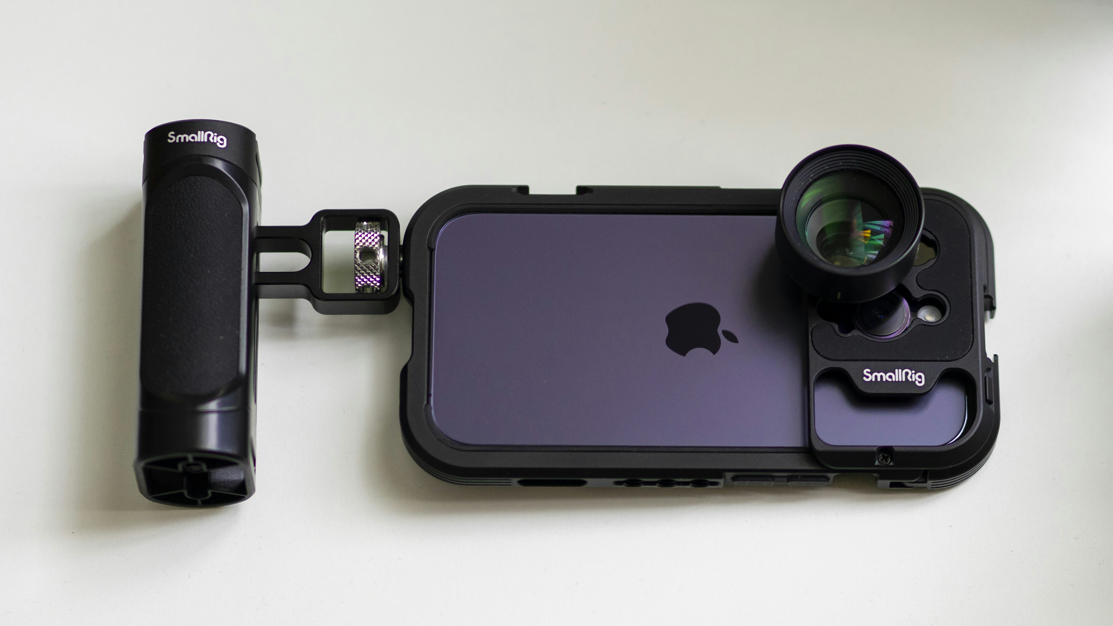an iphone with a camera attached to it