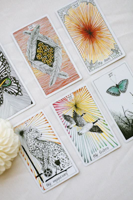 a bunch of cards that are on a table