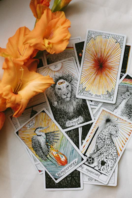 tarot cards with yellow flower on a table