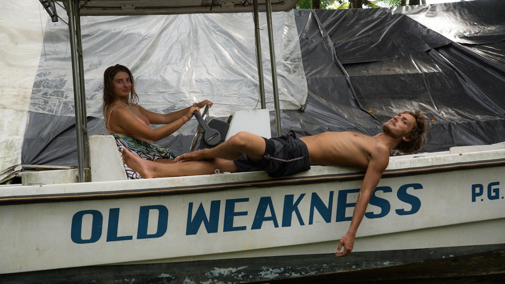 a couple of people that are on a boat