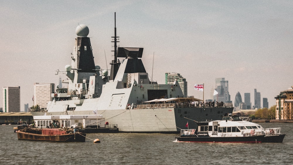 a large battleship sitting in the middle of a body of water