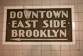 a sign that is on the side of a wall