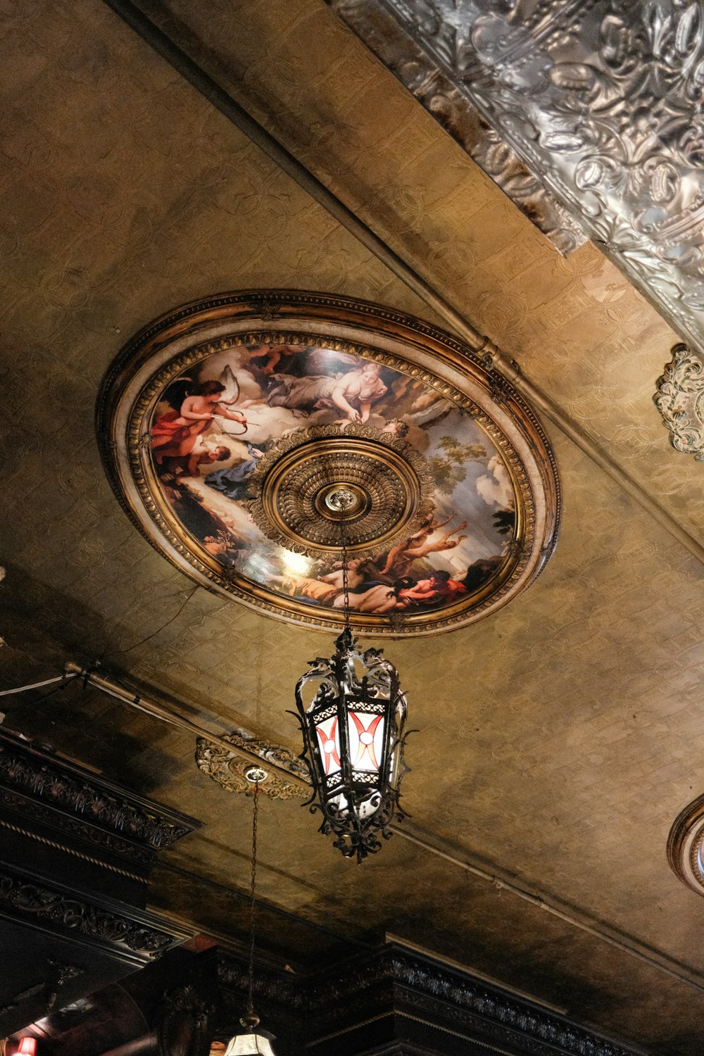 a chandelier hanging from the ceiling of a room