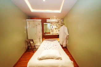 A serene therapy room with soft lighting and calming decor.