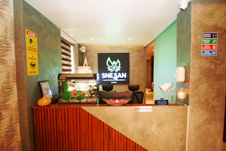 Front view of SNG Hardware Damafalls headquarters bustling with customers and staff.