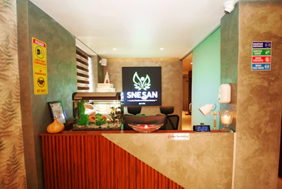 A welcoming office space with the NSP Properties logo prominently displayed on the wall.