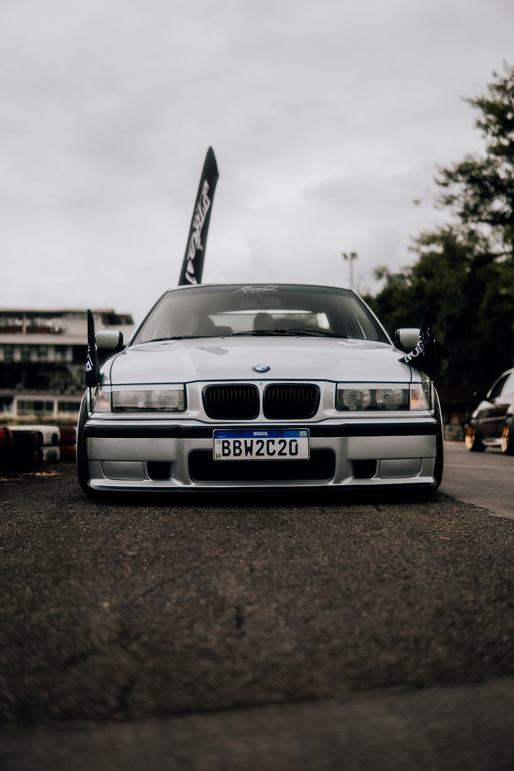 a white car parked in a parking lot