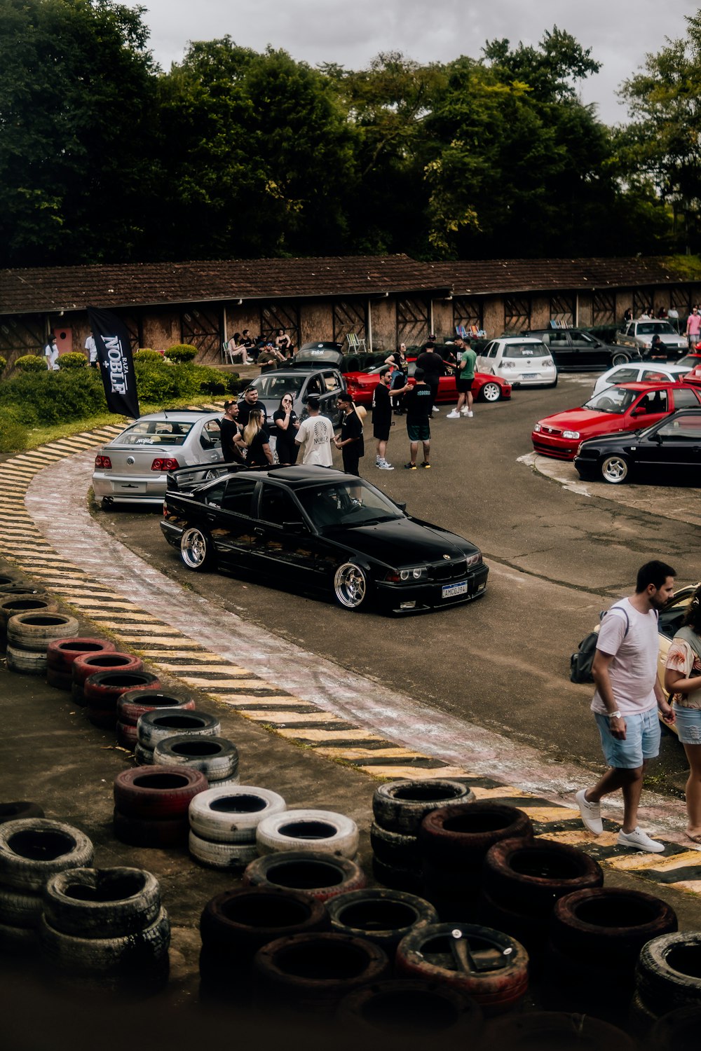 a parking lot filled with lots of parked cars