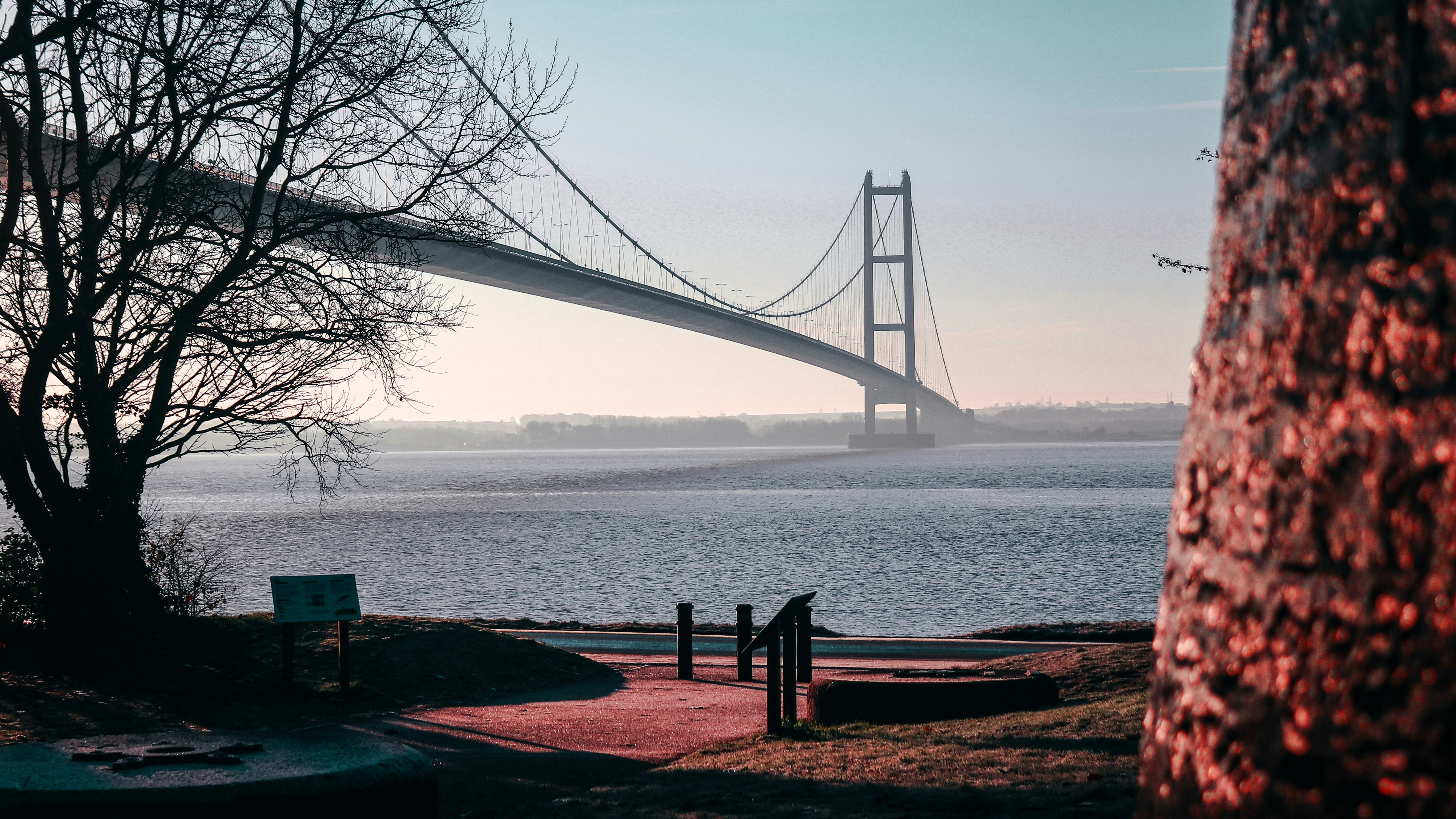 a view of a bridge over a body of water