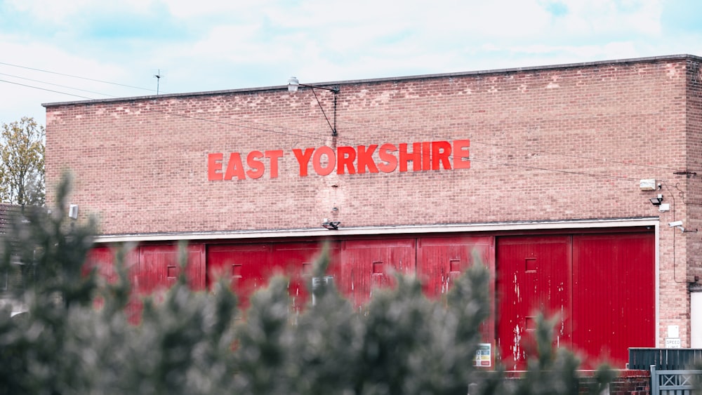 a brick building with a red sign that says east yorkshire