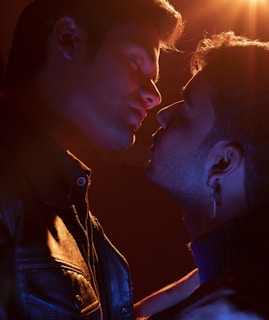 a couple of people standing next to each other