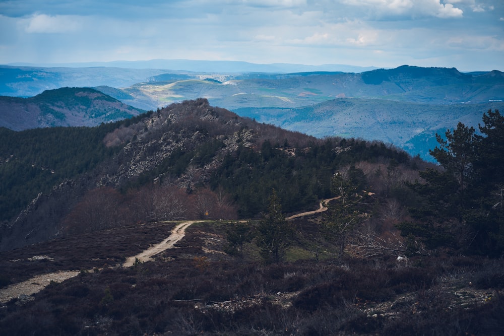 a view of a mountain with a road going through it