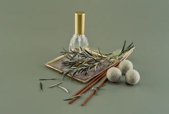 a bottle of perfume sitting on top of a table