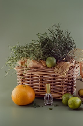 Close-up of aromatic herbs and natural soaps arranged in a rustic basket.