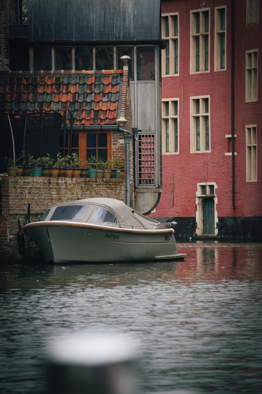 a boat floating on top of a body of water