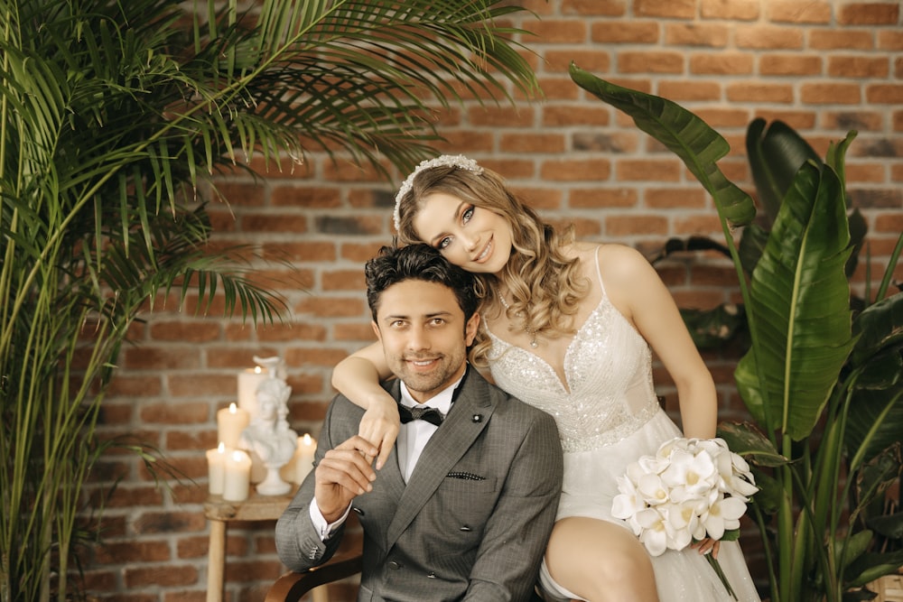 a bride and groom posing for a picture