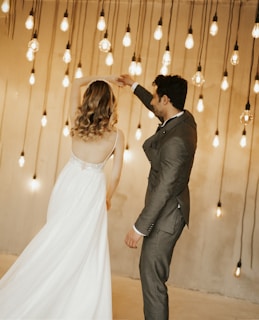 a man and a woman standing next to each other