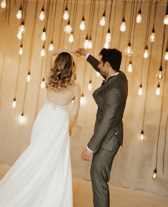 a man and a woman standing next to each other