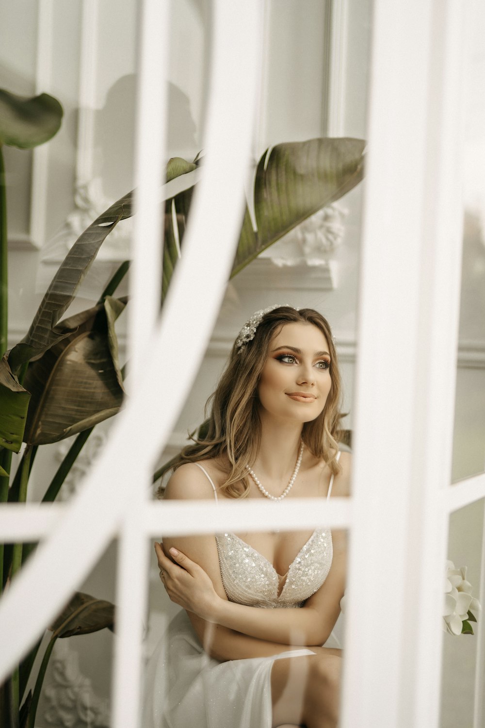 a woman in a white bra posing for a photo