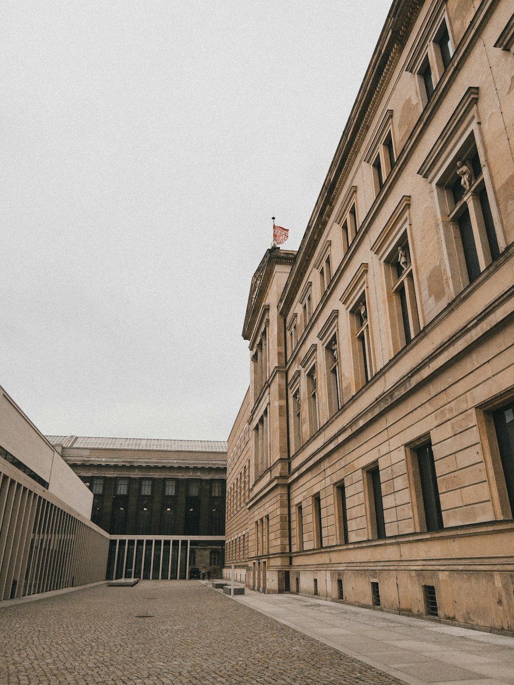 a large building with a flag on top of it