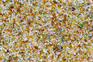 a close up of a pile of glass