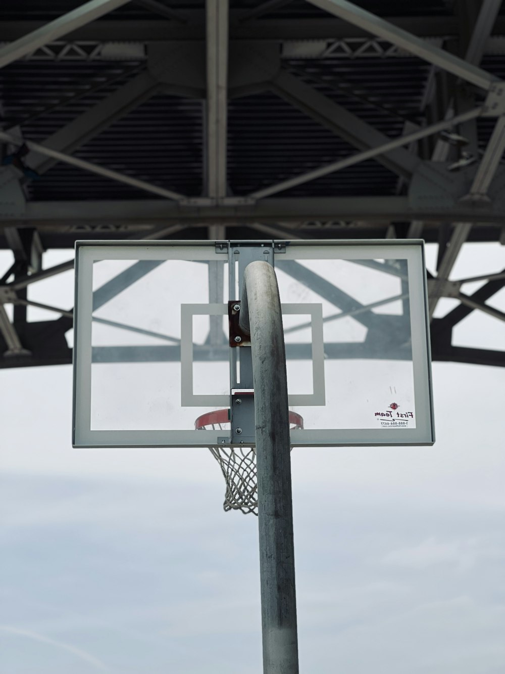 a basketball hoop with a sky background