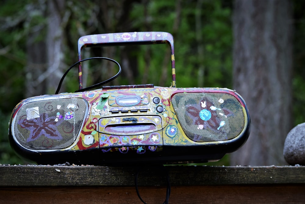 a radio sitting on top of a wooden table