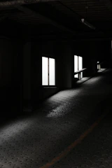 Close-up of a glossy epoxy garage floor reflecting natural light.