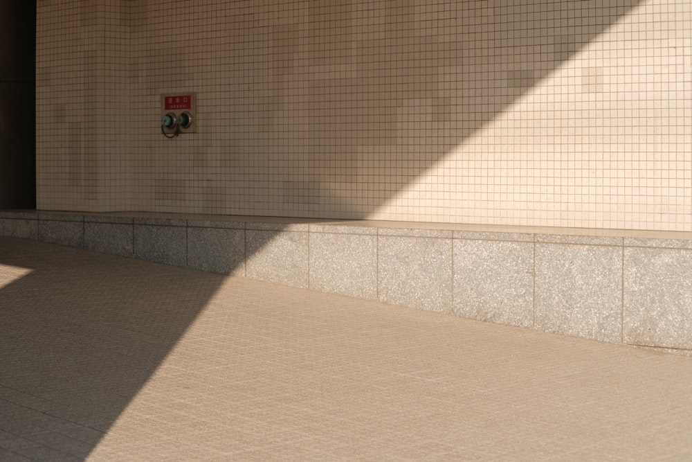 a man riding a skateboard down a sidewalk