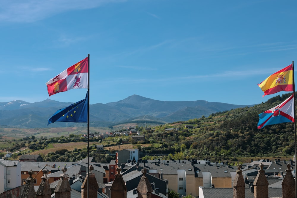 a group of flags flying in the air