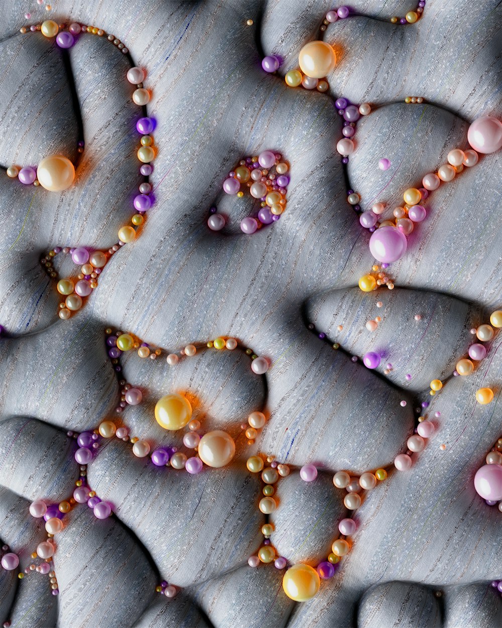 a close up of beads and beads on a surface