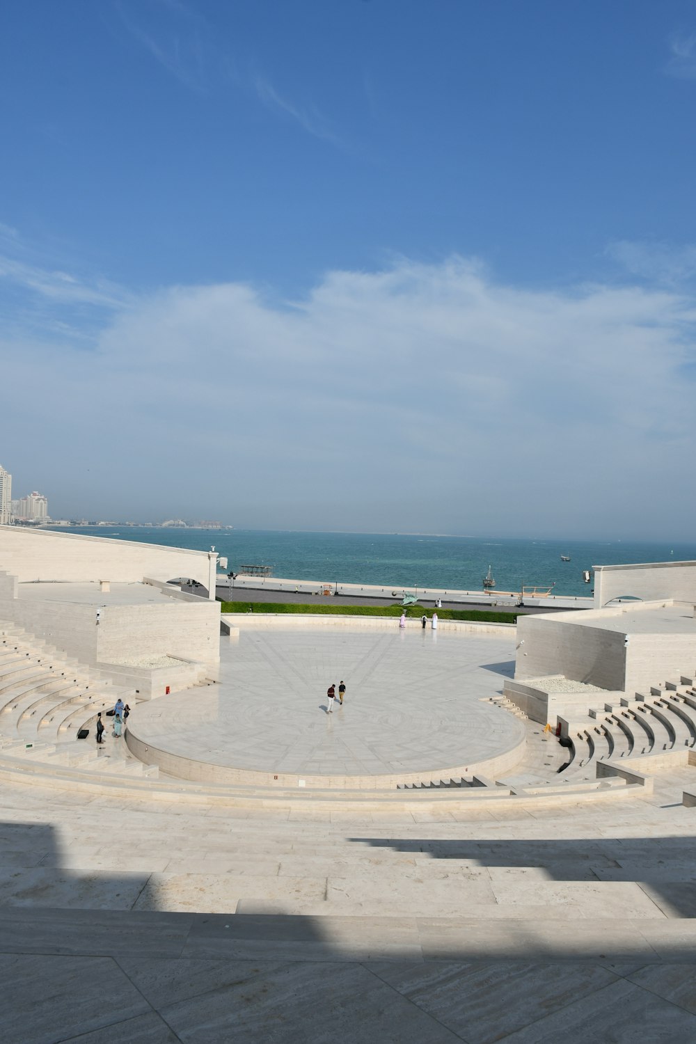 a view of the ocean from the top of a building