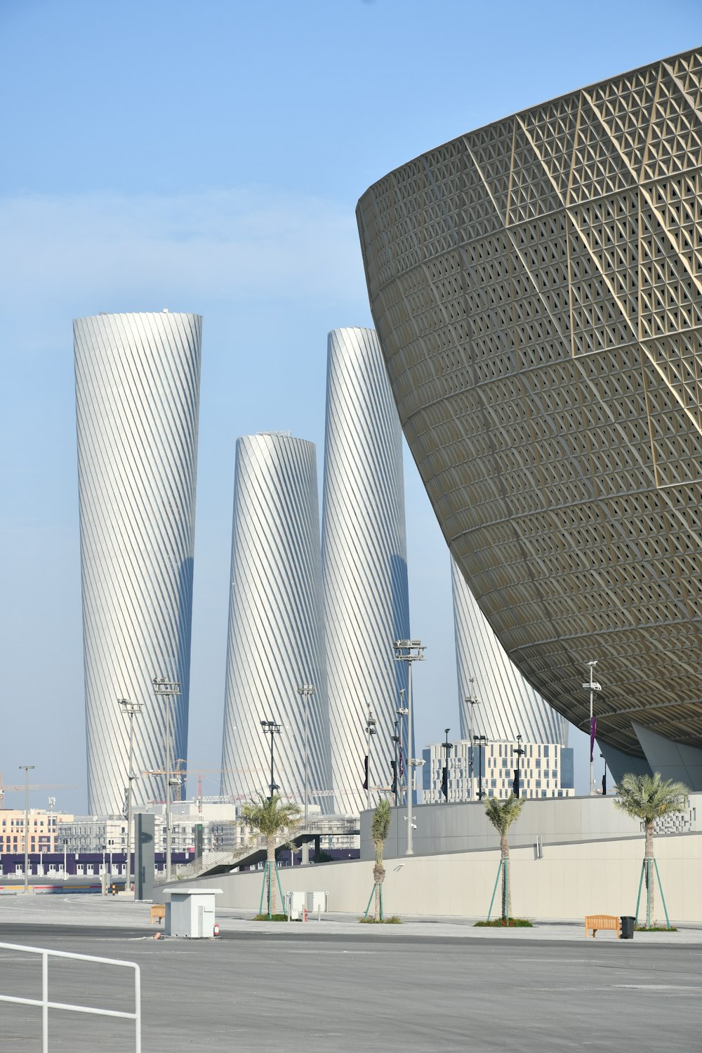 a large building with a lot of tall buildings in the background