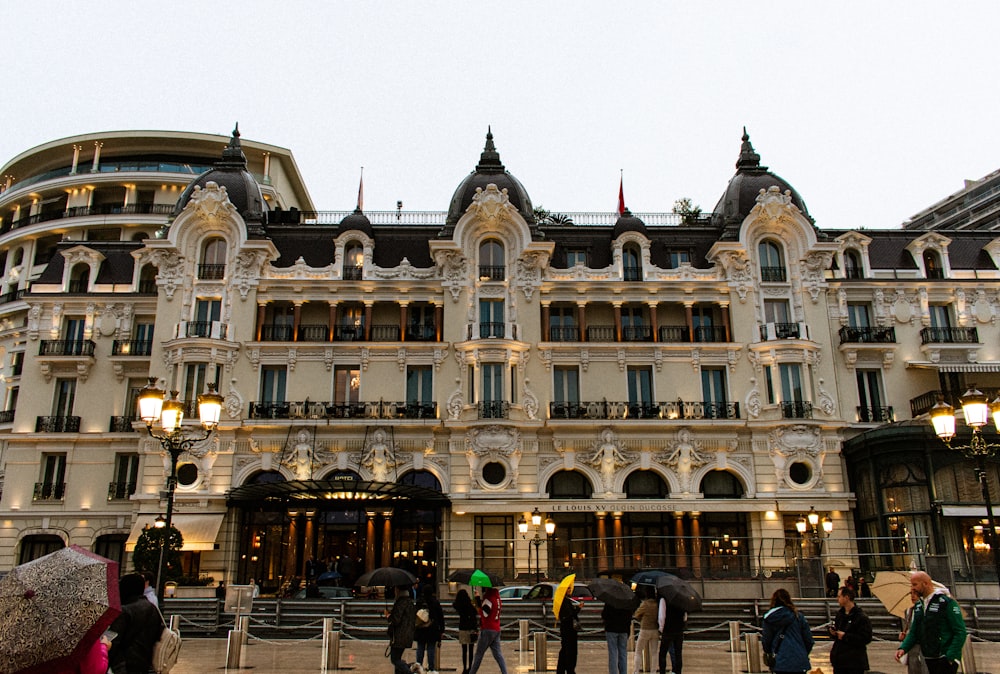 a group of people standing in front of a building