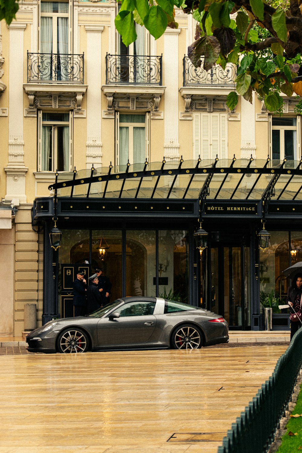 a car that is parked in front of a building