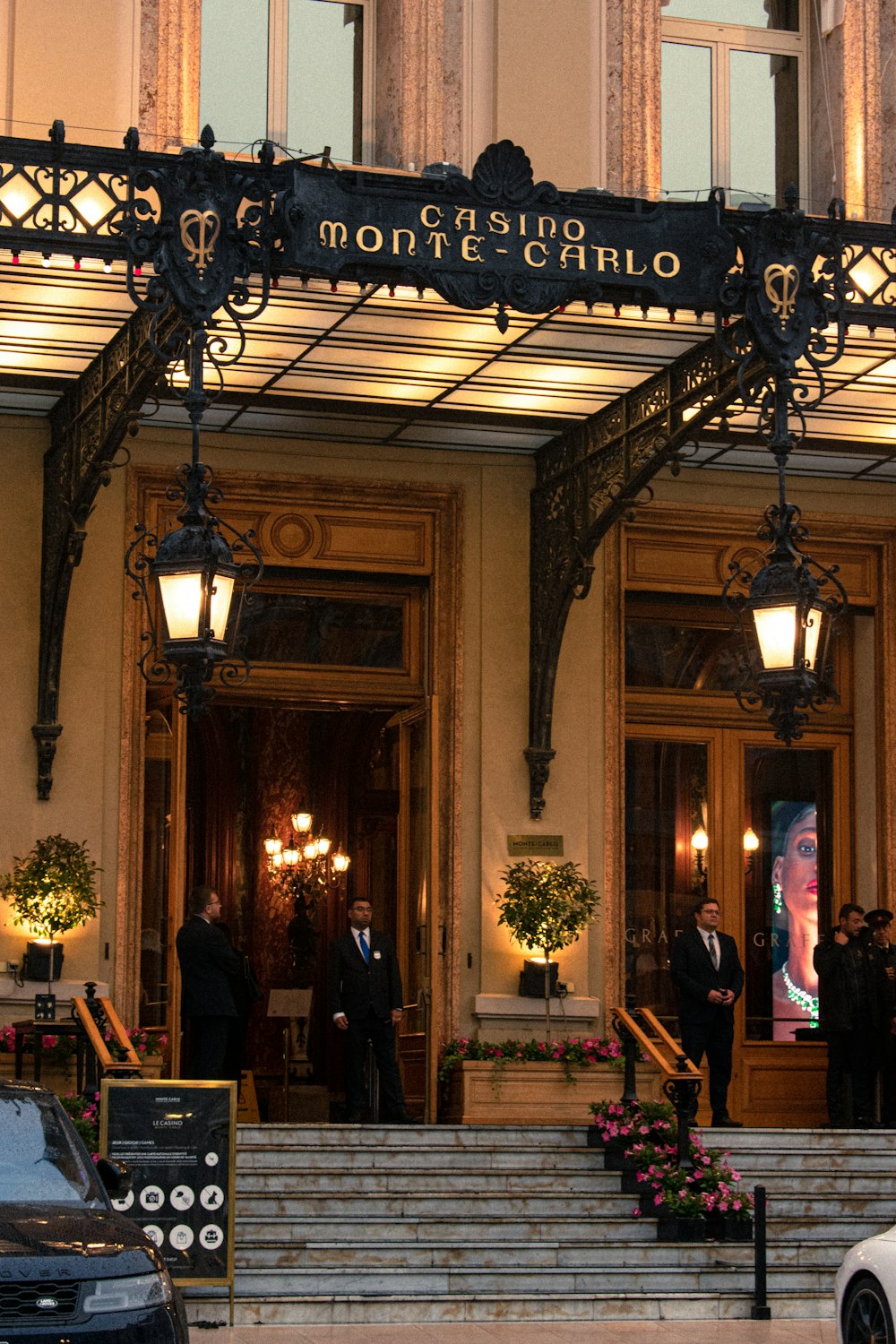 a group of people standing outside of a building