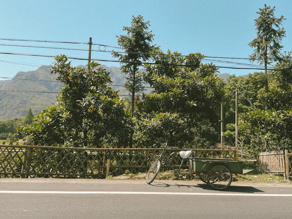 a bicycle parked on the side of the road