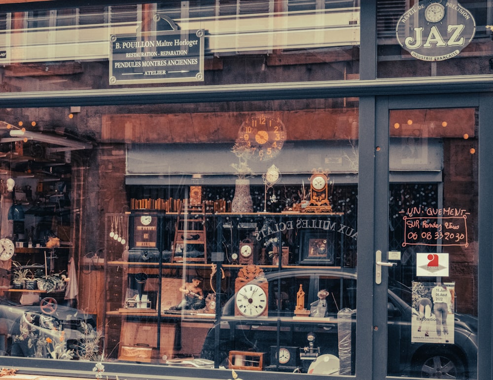 a store front window with a car in the window