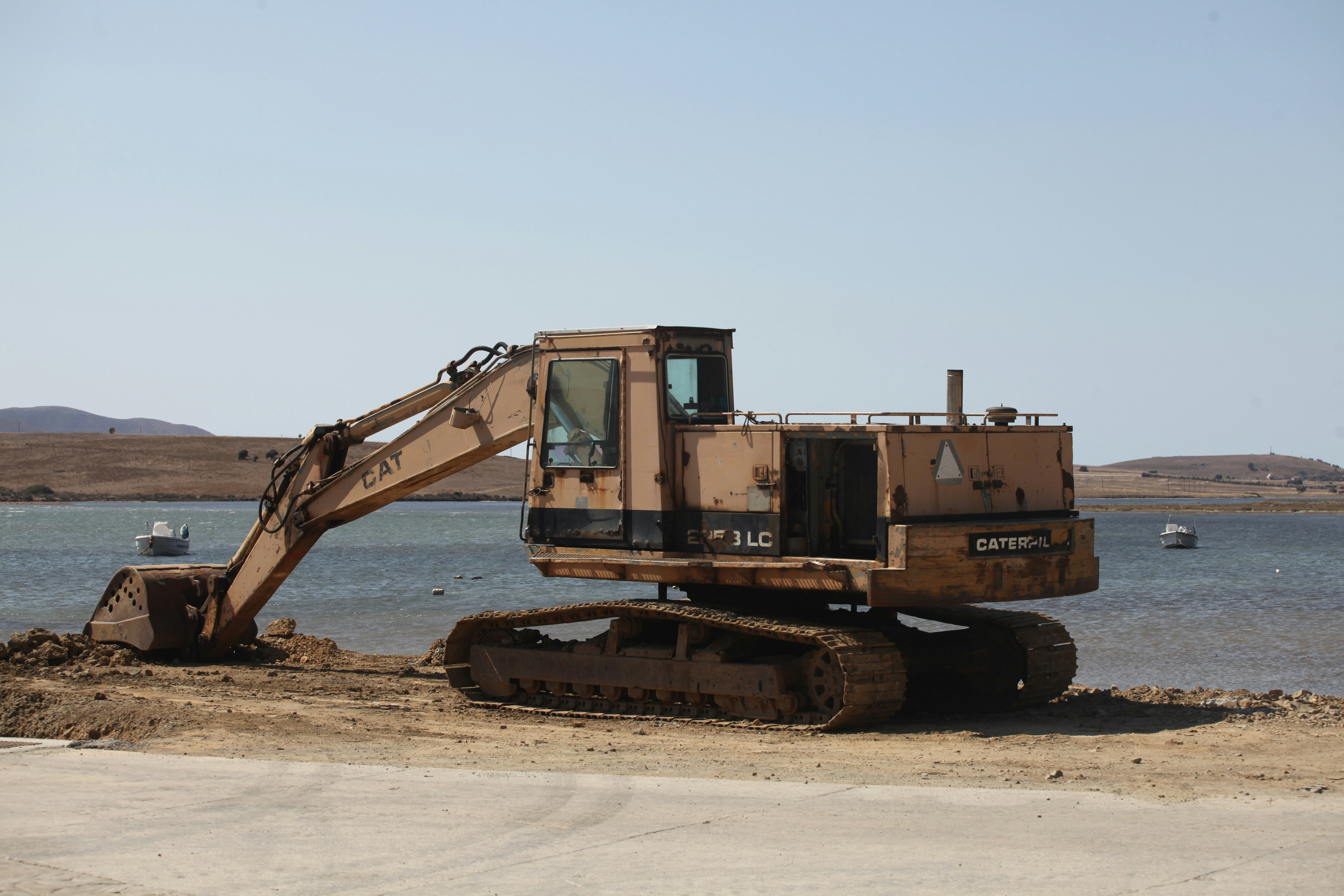 a bulldozer is parked on the side of the road