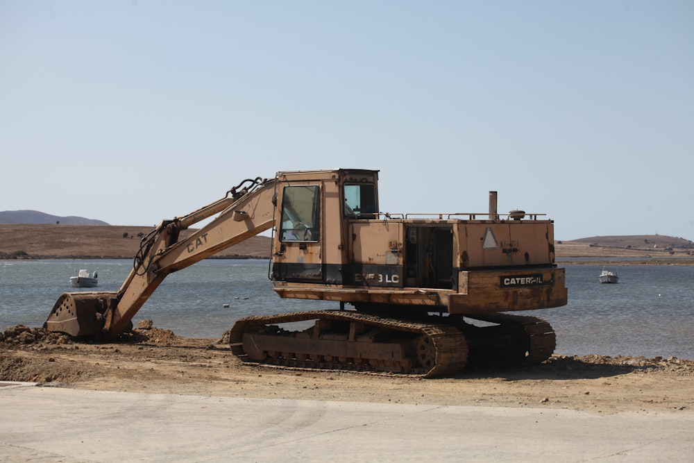 a bulldozer is parked on the side of the road