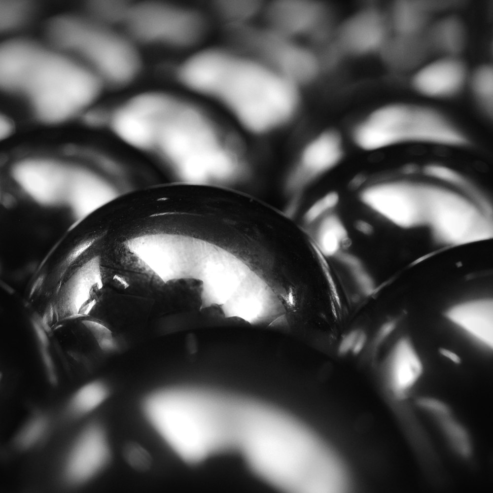 black and white photograph of shiny balls