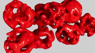 a group of red objects sitting on top of a table