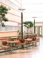 Bright common area with comfortable seating and clean surroundings for relaxation.