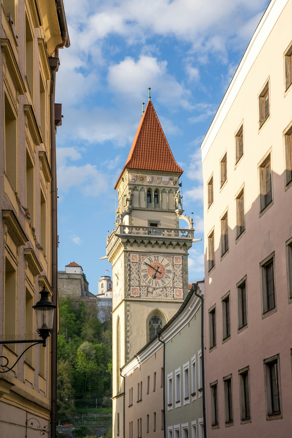 a tall clock tower towering over a city