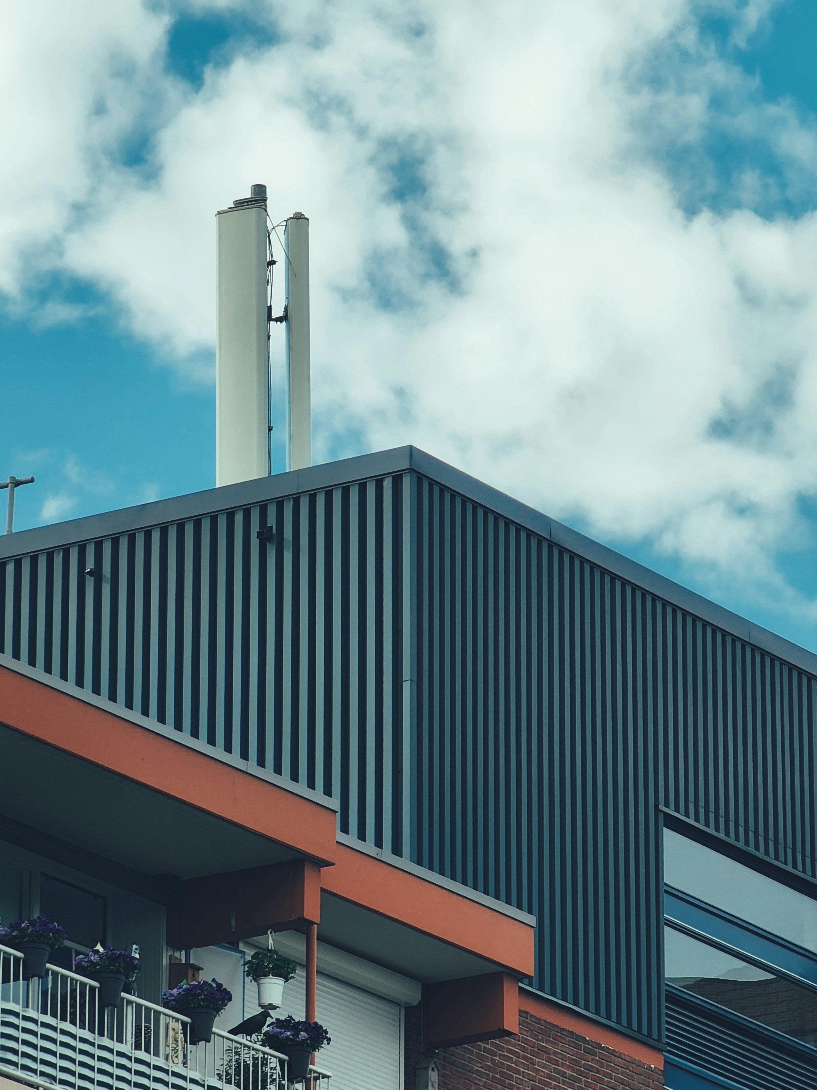a tall building with a clock on the top of it