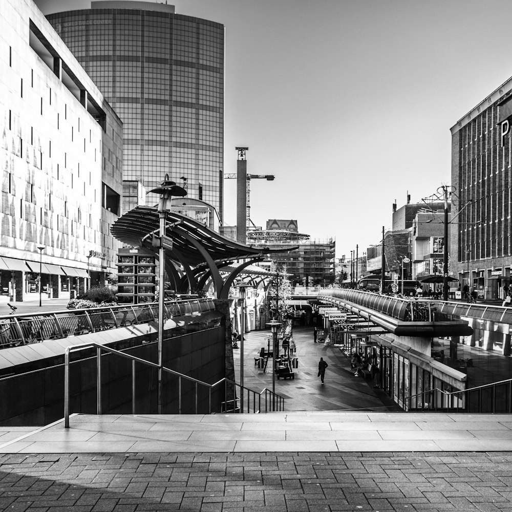 a black and white photo of a train station